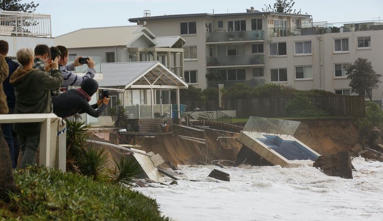 people photograph pool collapsed into ocean